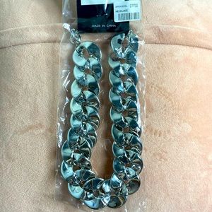 Beautiful necklace never worn in plastic